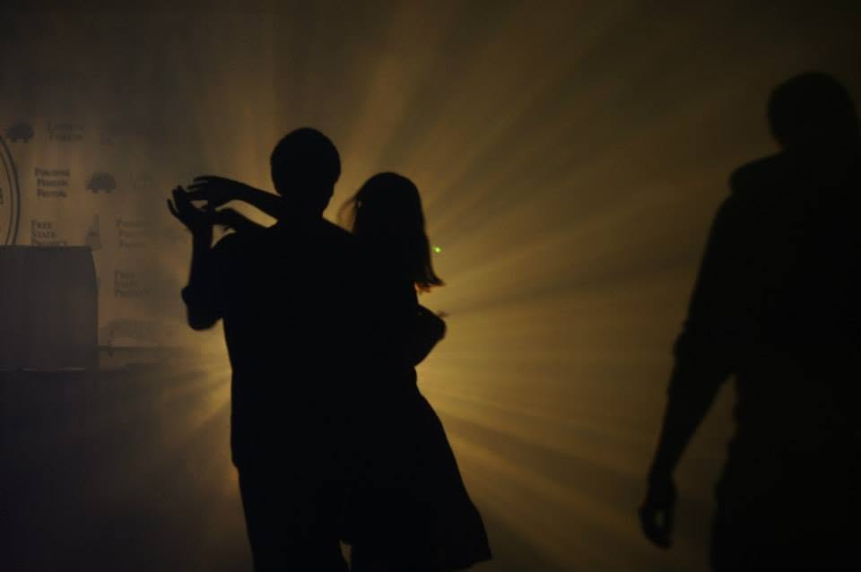 A couple dancing in silhouette
